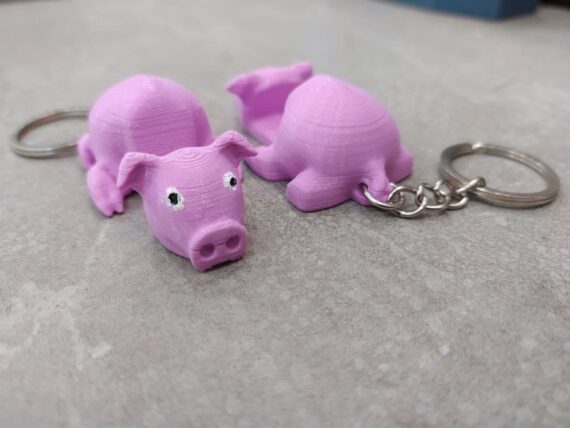 Llavero Portamóvil Cerdito BACK